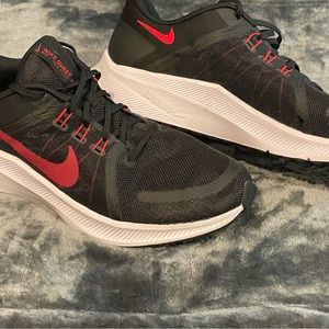 Men’s size 13 Nike Quest running shoes.